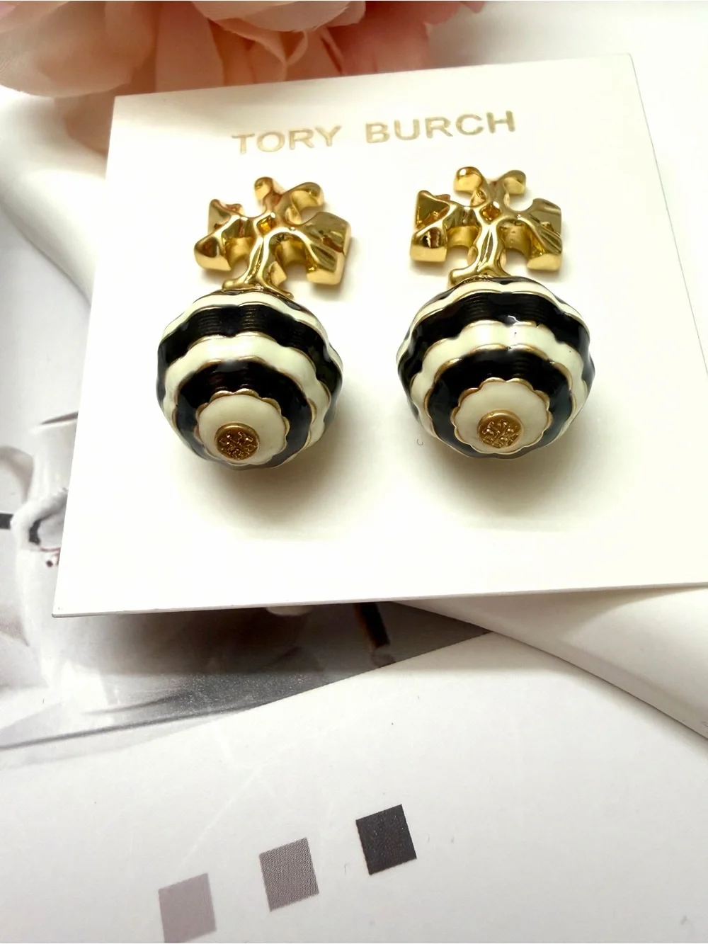 Tory Burch Gold Logo Drop Earrings with Black and White Striped Spheres